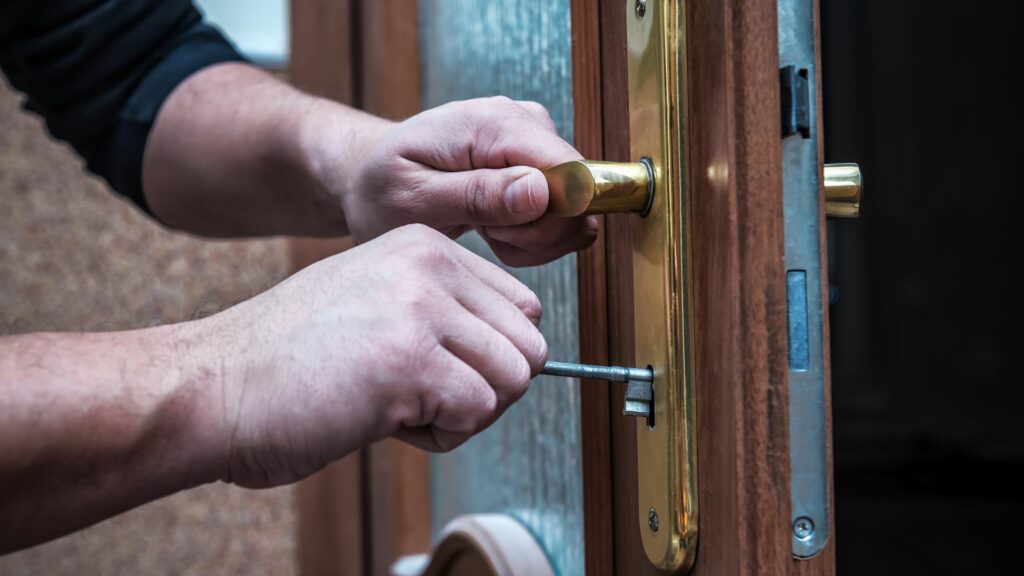 A locksmith helps with a lockout, one of the common locksmith services 