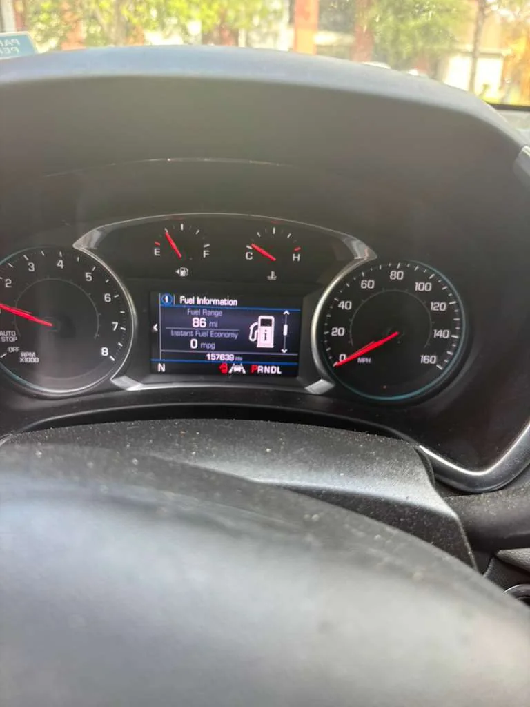 vehicle ignition and dashboard checked during key service, real company service photo 2