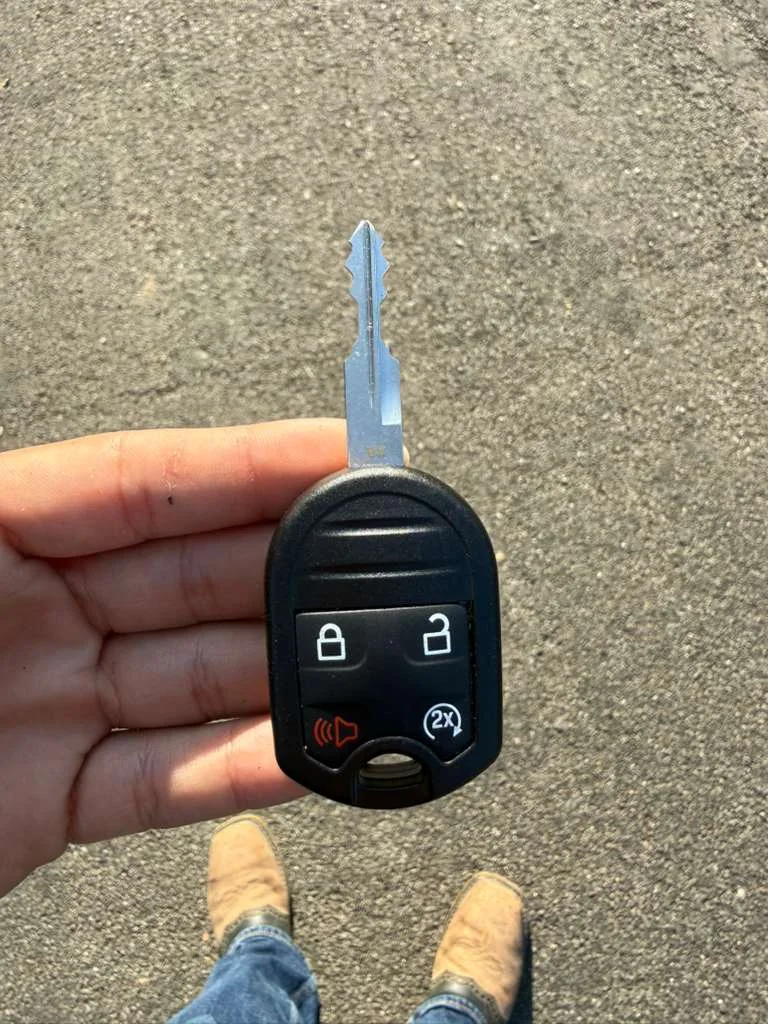 vehicle key and car prepared for replacement service, real company service photo 4