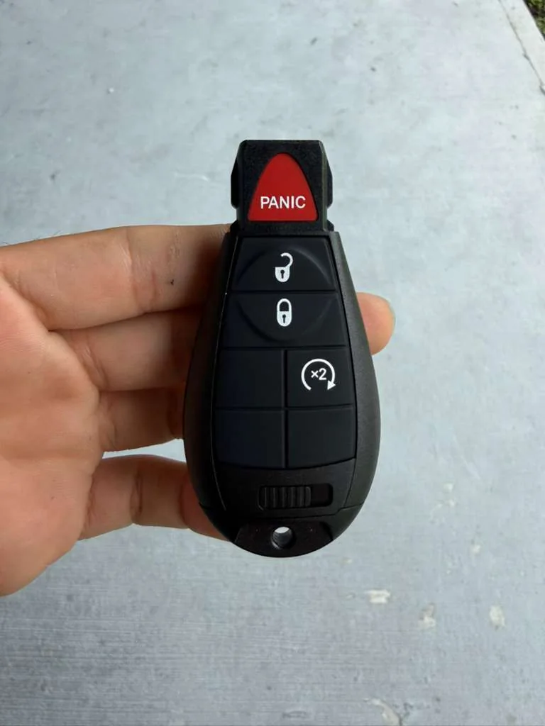 vehicle key and car prepared for replacement service, real company service photo 2