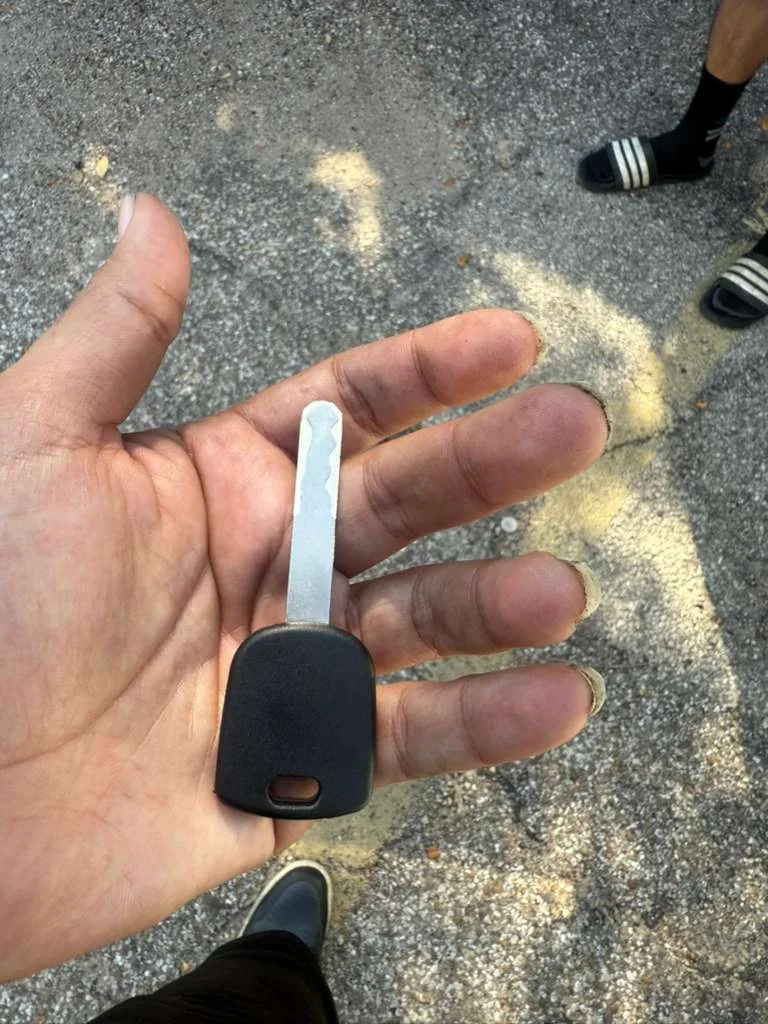vehicle key and car prepared for replacement service, real company service photo 5